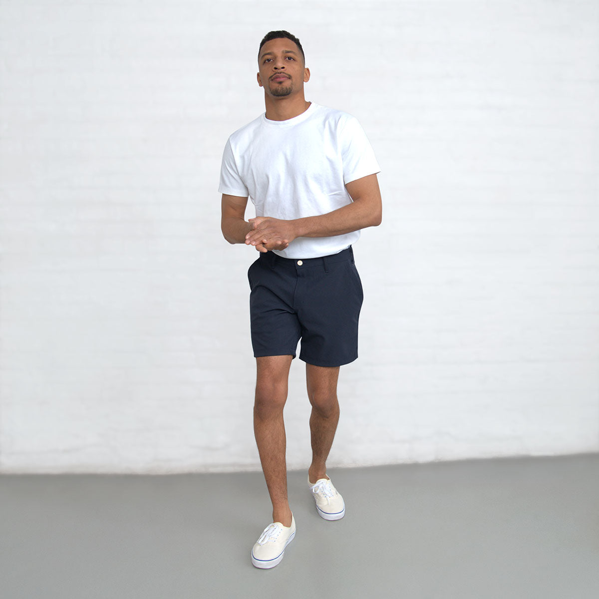 Front pocket detail on the navy technical shorts.