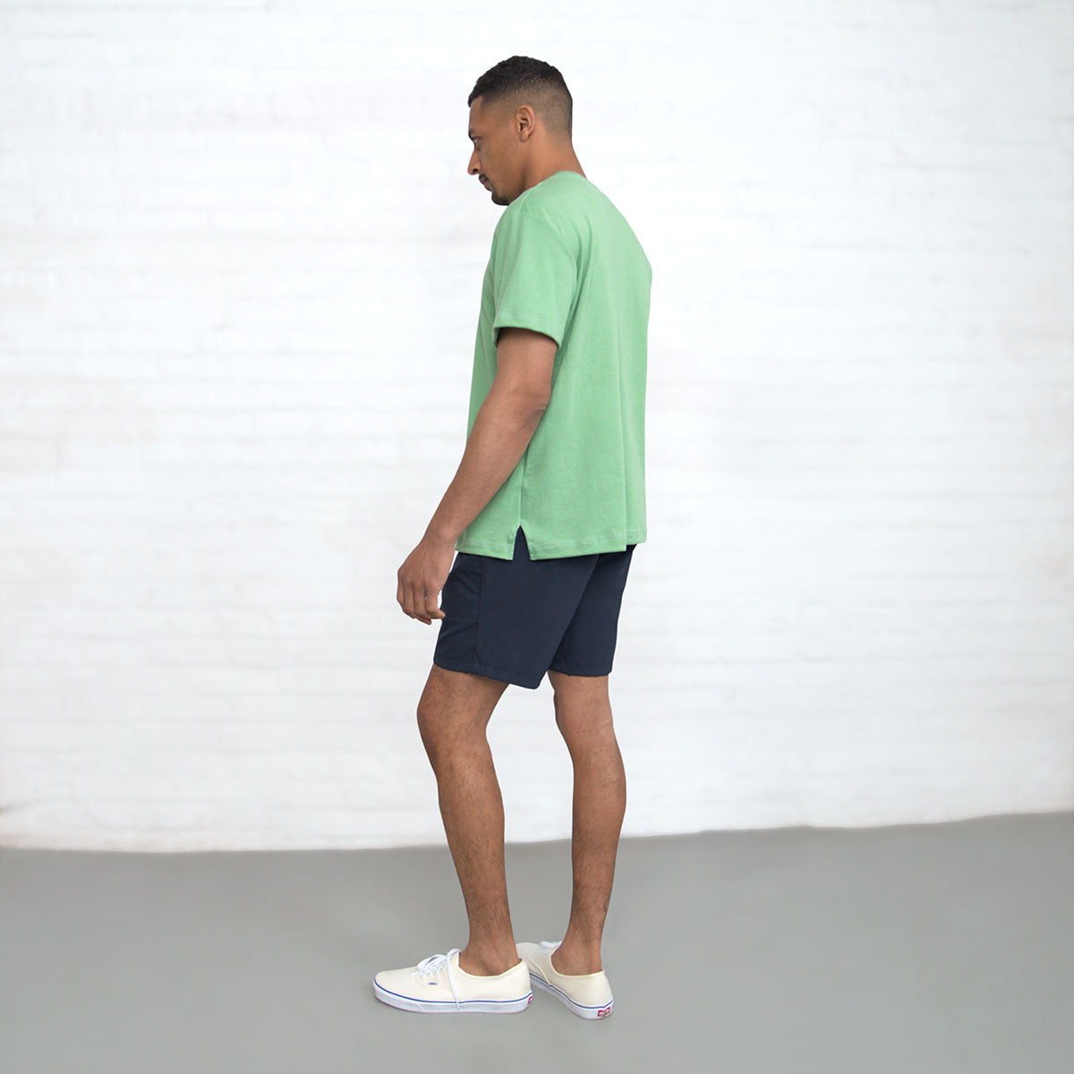Navy technical shorts folded to show the hem and leg opening.