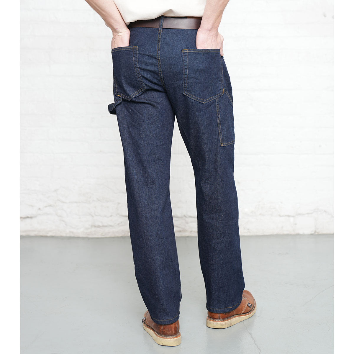 Close-up of hammer loop and pencil pocket on dark wash carpenter jeans