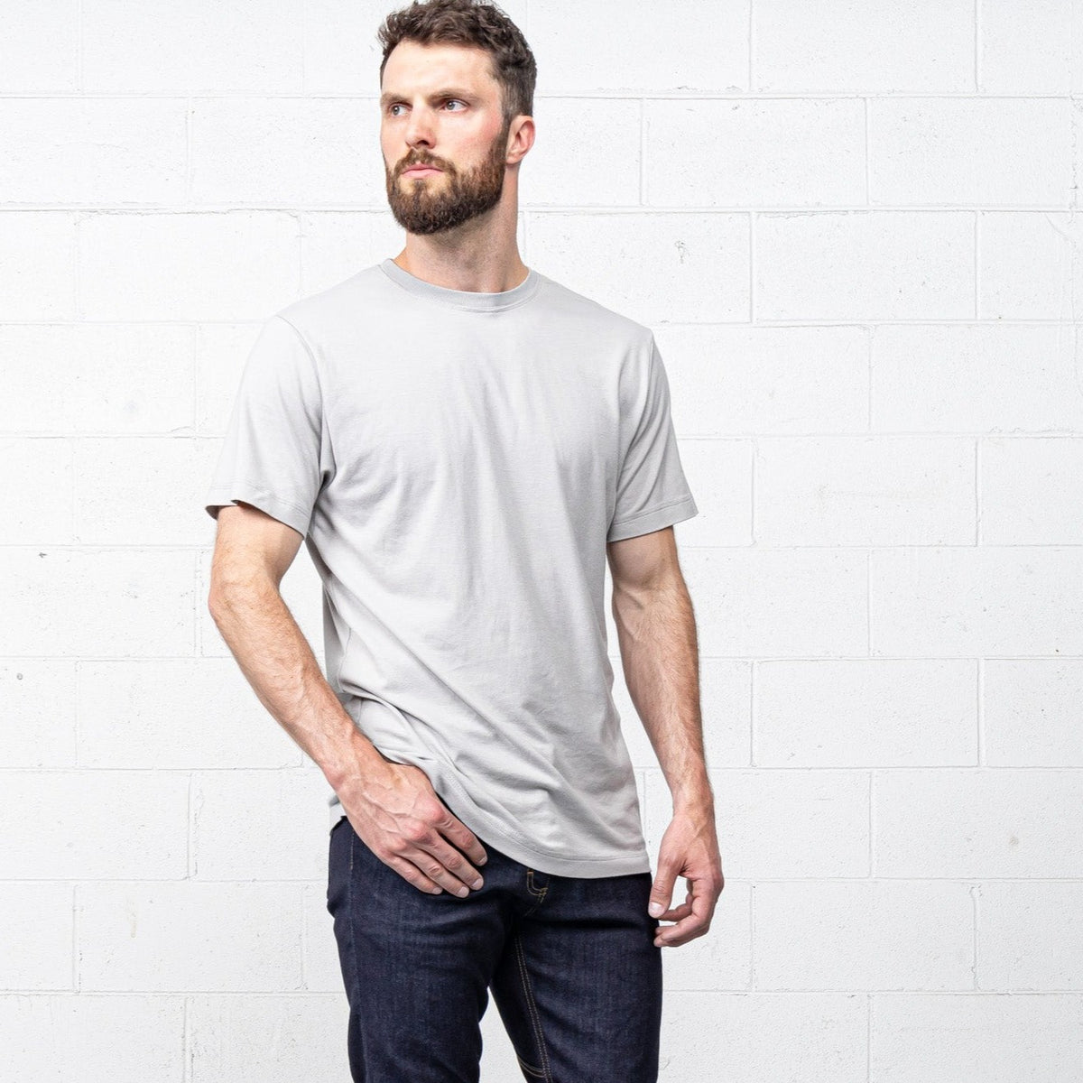 Close-up of the fitted crew collar on the grey t-shirt