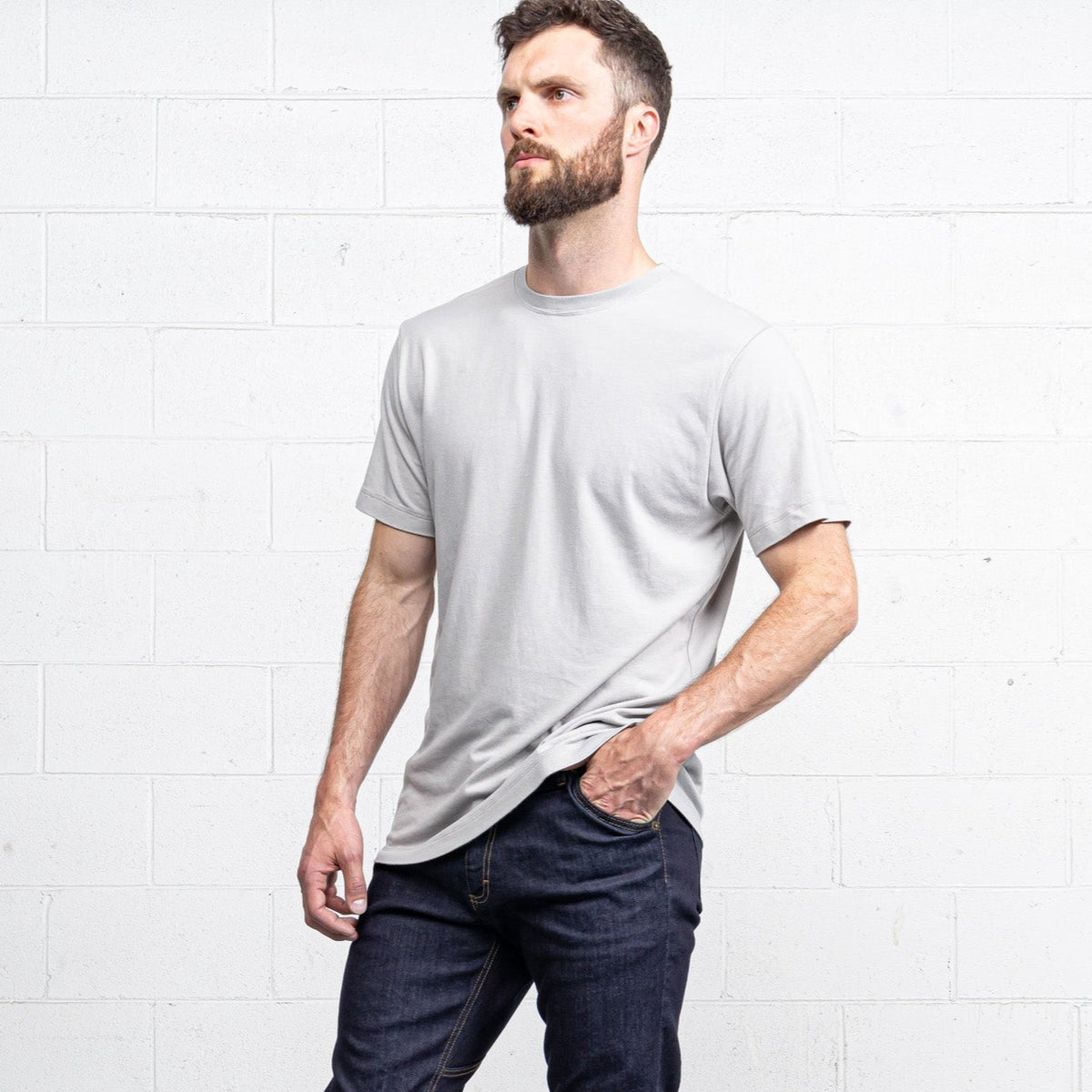 Close-up of the fine gauge interlock knit fabric in grey