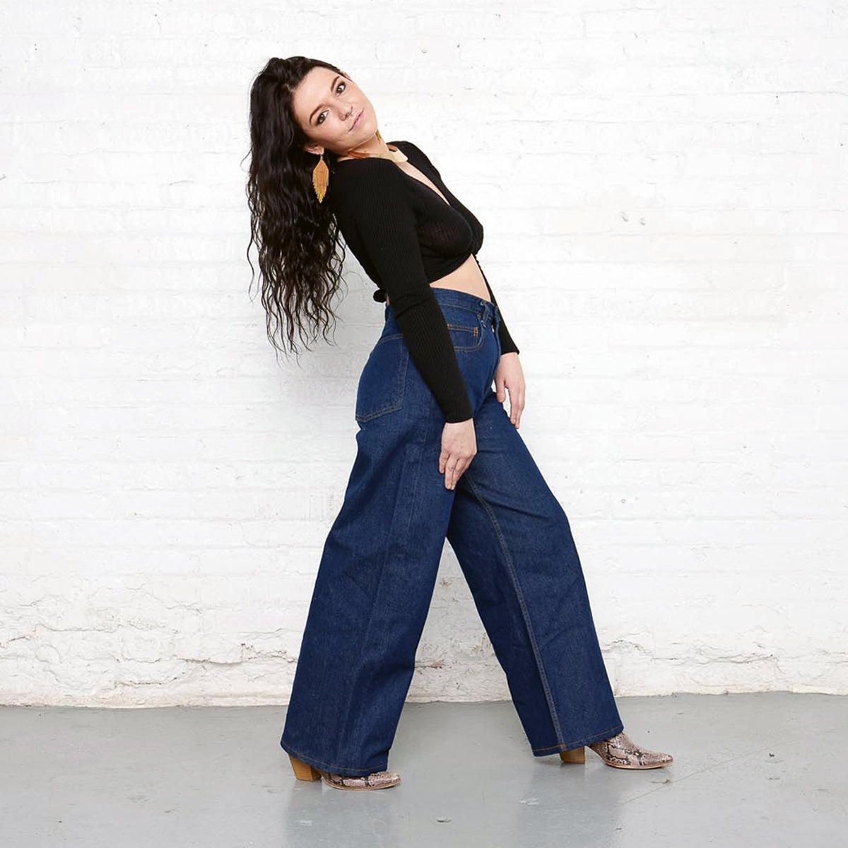 Front view of Palazzo high-rise wide leg jeans in dark wash cotton denim.