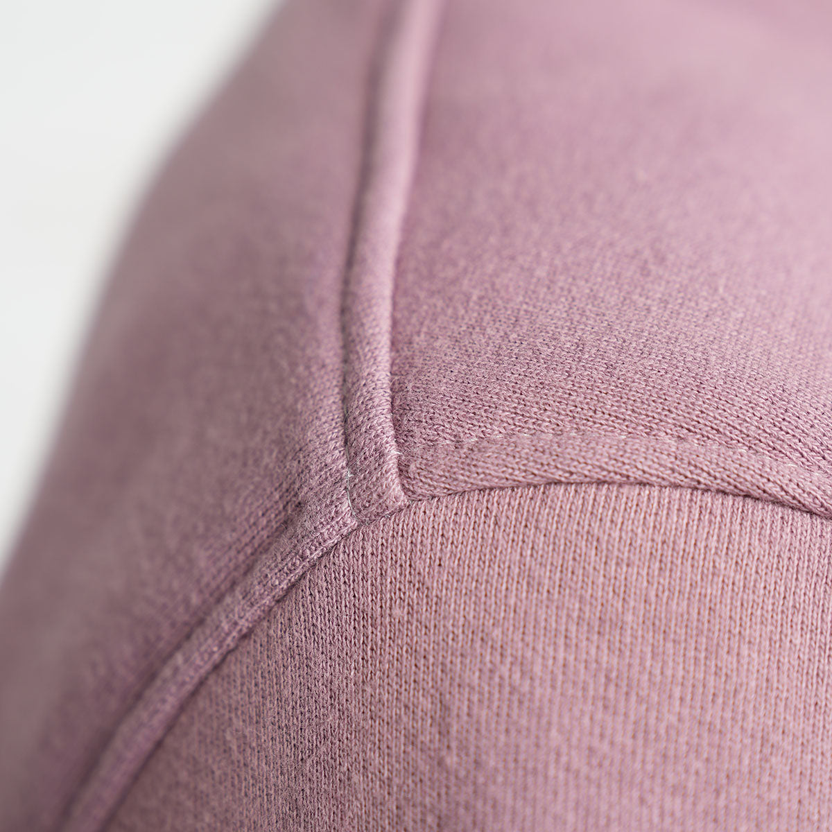 Close-up of the ribbed cuff and sleeve on the rose taupe sweatshirt