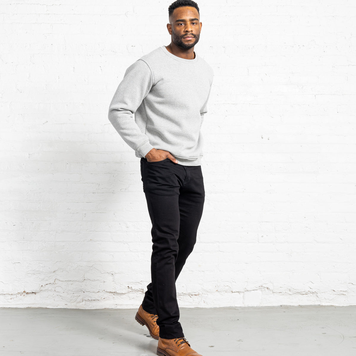 YKK zipper fly and waistband detail on black jeans