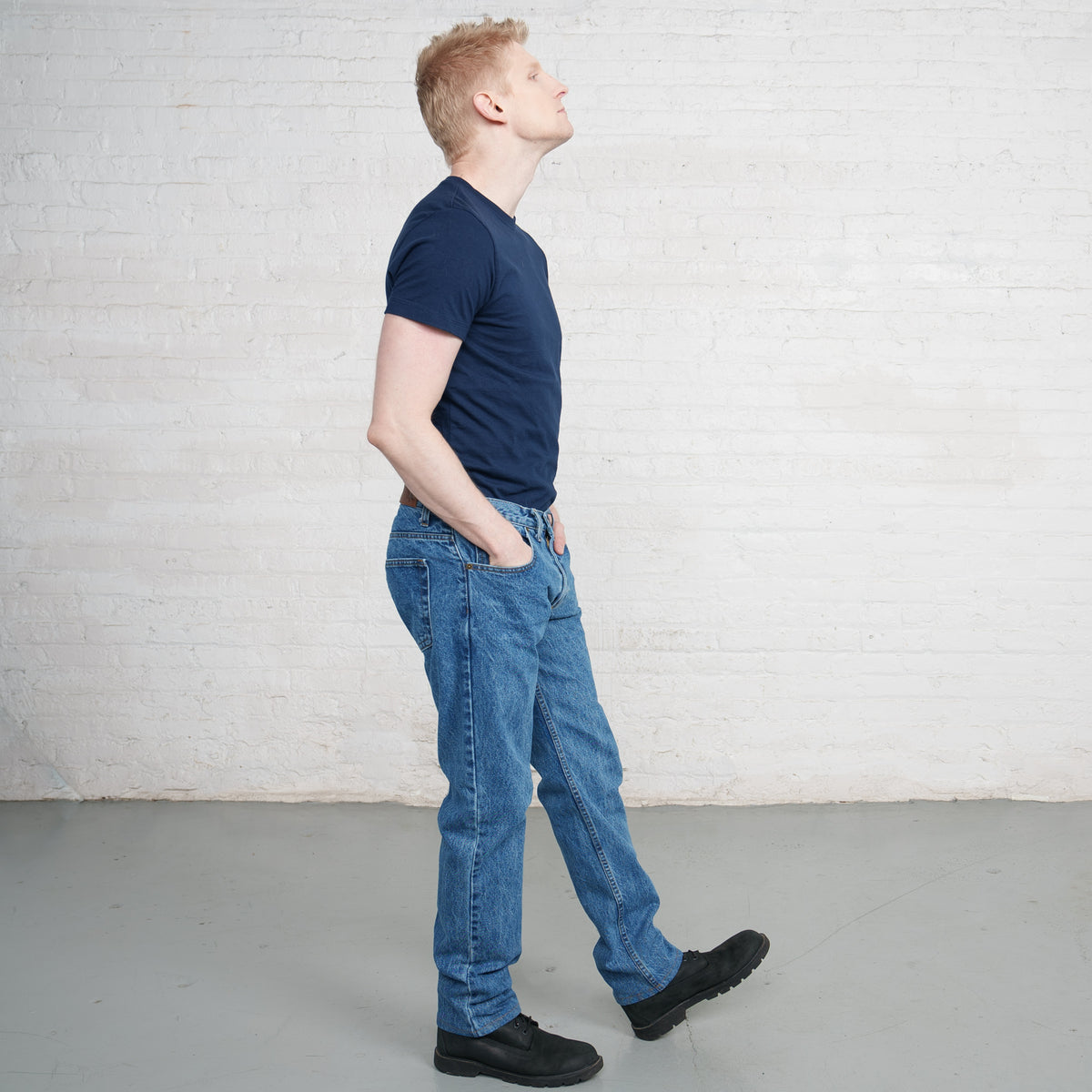 Close-up of the waistband and belt loops on Tailored Fit jeans