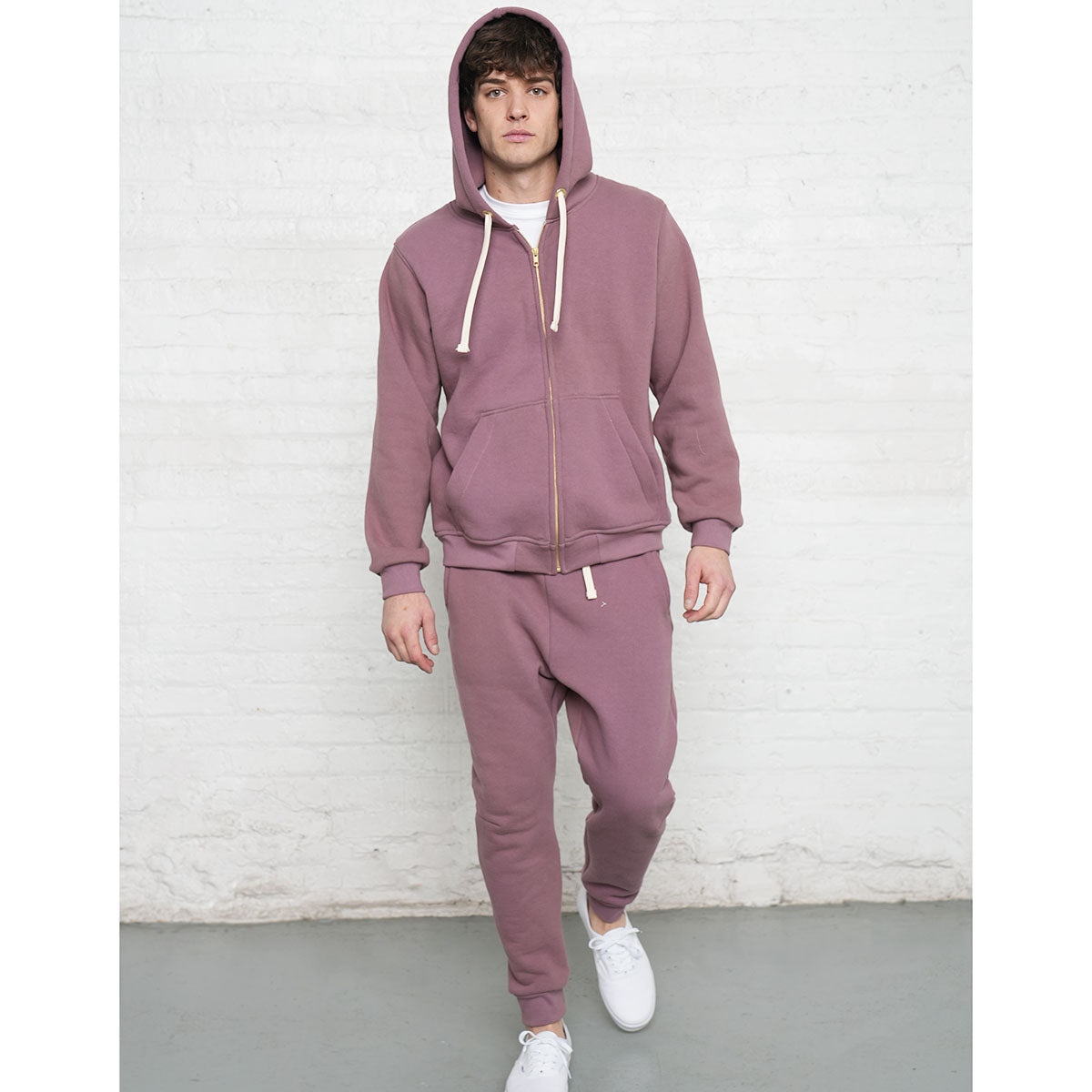 Close-up of the Horween leather patch on the rose taupe hoodie